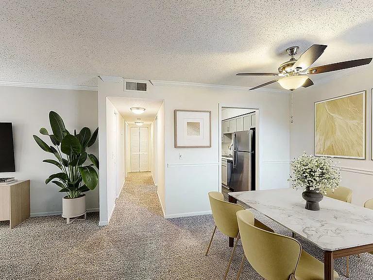Spacious living room & dining area with carpet
