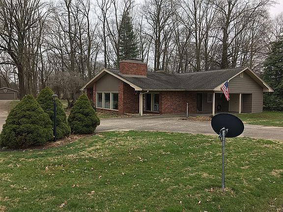 House from road; carport