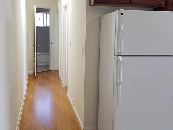 Hall leading to bedroom 1, 2, then bathroom.