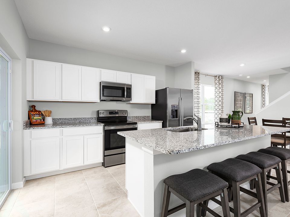 Easy low-maintenance main-level living with garage, close to beaches golf!