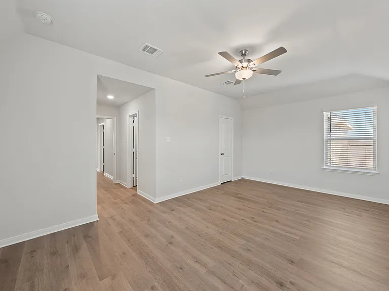 The master suite has a large bedroom, ensuite bathroom and two walk-in closets.