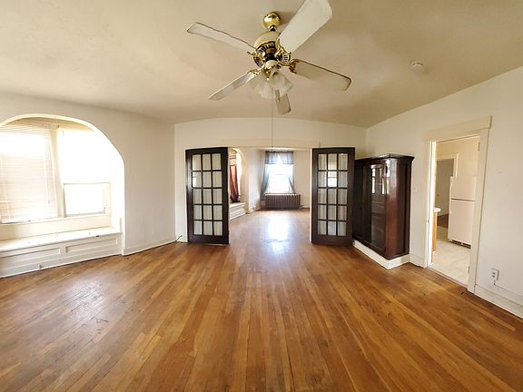 Dining Room with double doors open to living room