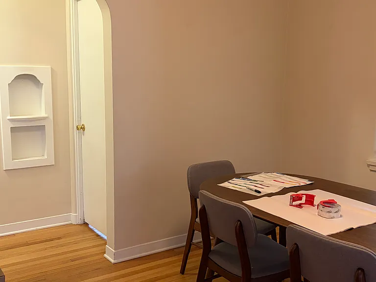 Dining room, first bedroom behind door