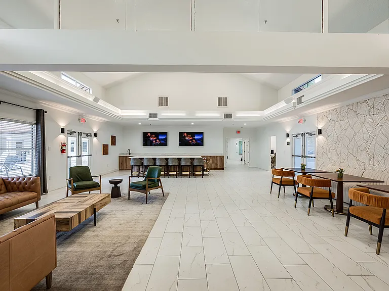 Open resident lounge designed for socializing and relaxation
