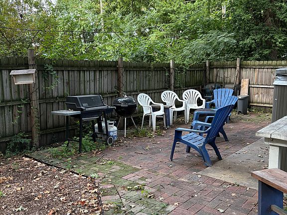 Back yard patio area. Pits provided for barbeque