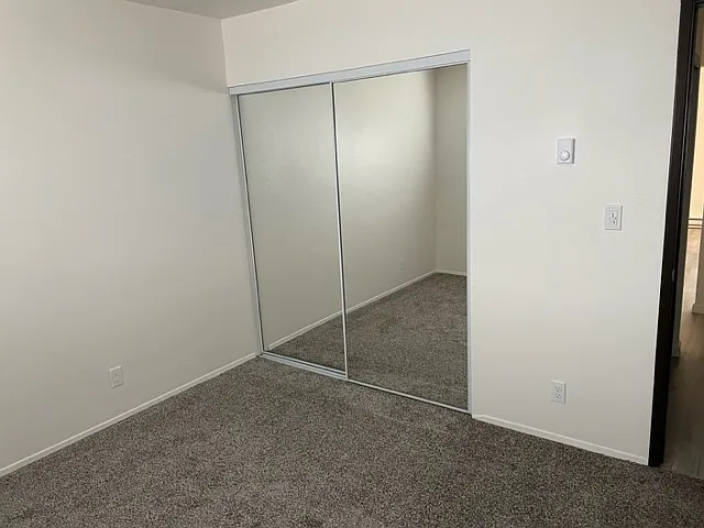 Mirror wardrobe in bedroom