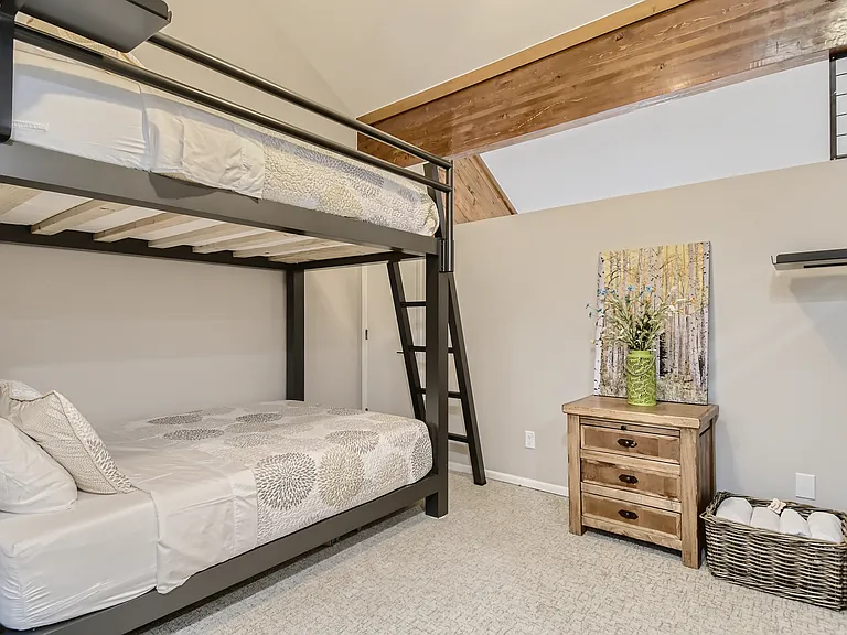 Bunk Bed room: Room contains 5 QUEEN size beds (not full sized), this is the double bunk bed with spacious head room on both levels (not pictured is the Triple bunk bed in same room)
