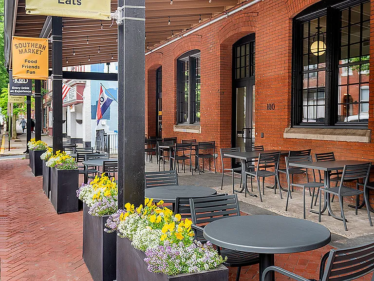 Experience the charm of Southern Market's outdoor dining, where relaxation meets style.