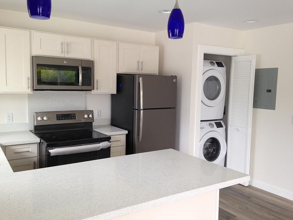 Kitchen with breakfast bar includes new fridge, stove, micro