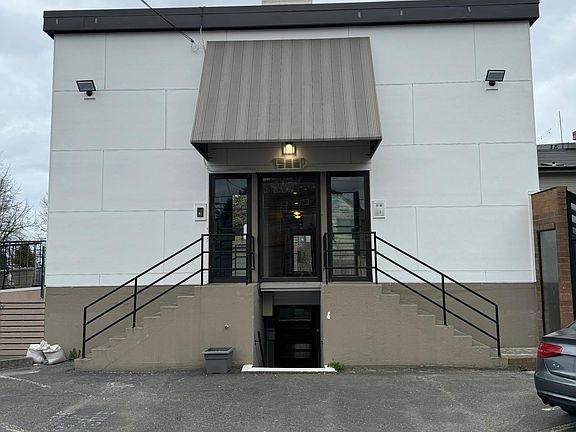 One complimentary parking spot in back of the building