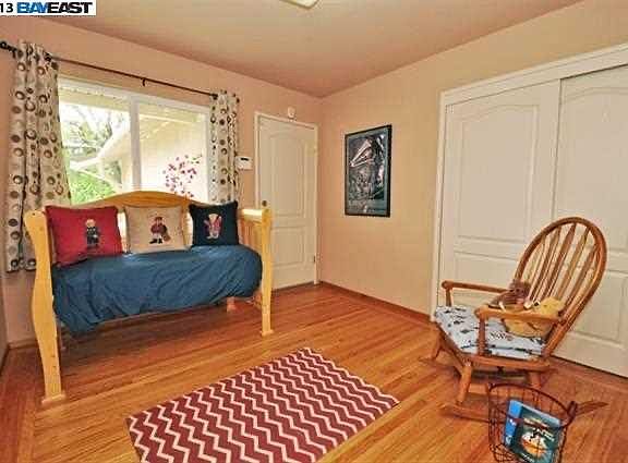 This is the third bedroom. PLEASE NOTE that one must walk through this room to get to the garage.