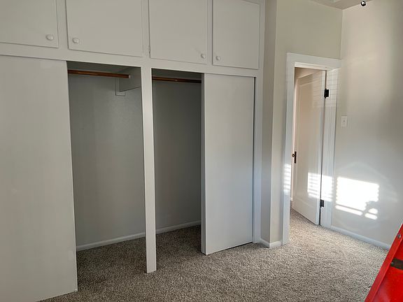 Bedroom two with lots of storage