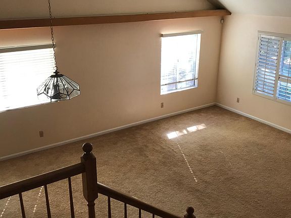 View of living/dining room from stairs