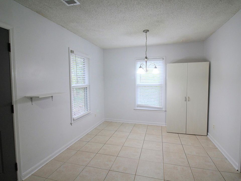 Dining area with added shelving for pantry