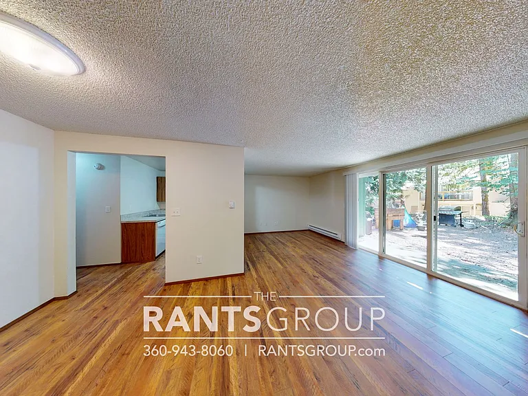 Lovely, wooded 2-bedroom apartment with a large private deck and in-unit washer & dryer! — Photo 34