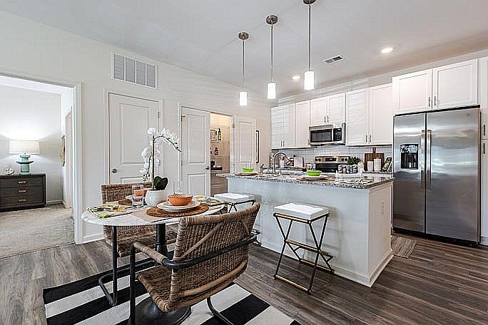 Experience contemporary living with this beautifully designed open-concept kitchen and dining space.