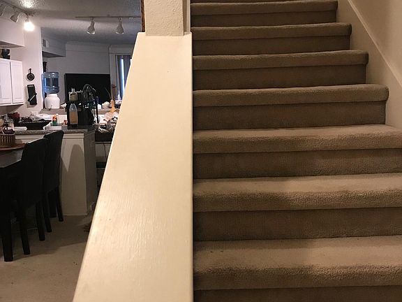 Stairs from second to third level. Ground level is the garage.