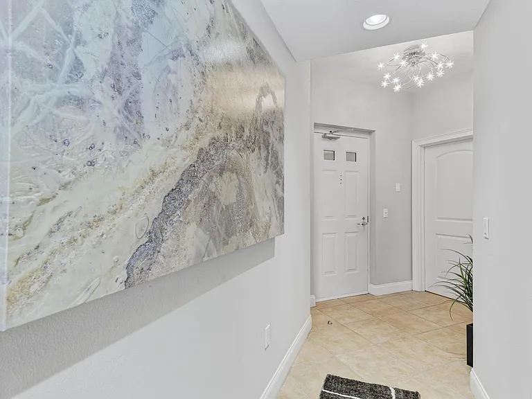 611 Riviera Dunes Way #304 — Photo 4