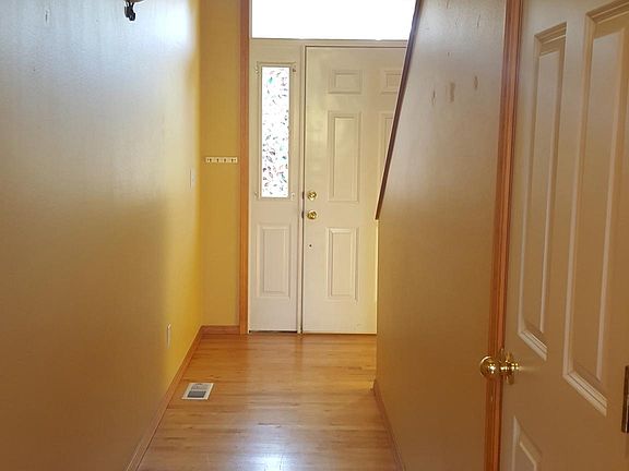 Older hardwoods as you enter. Spacious coat closet.