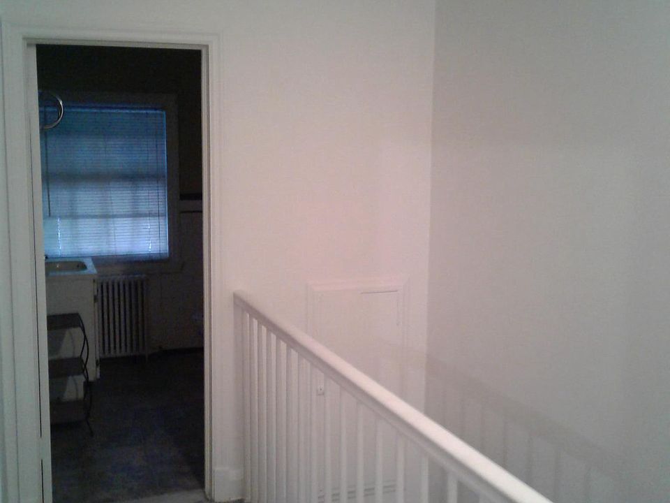 Hallway leads to bathroom