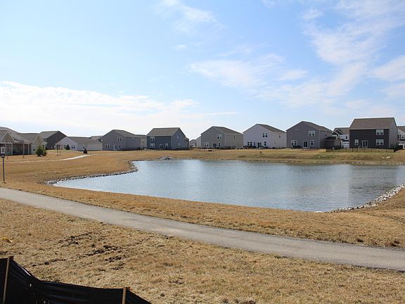 Backyard backs in to pond with walking trail