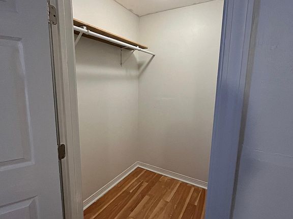 Walk in closet in the primary bedroom (with total of 3 bedrooms in the house)