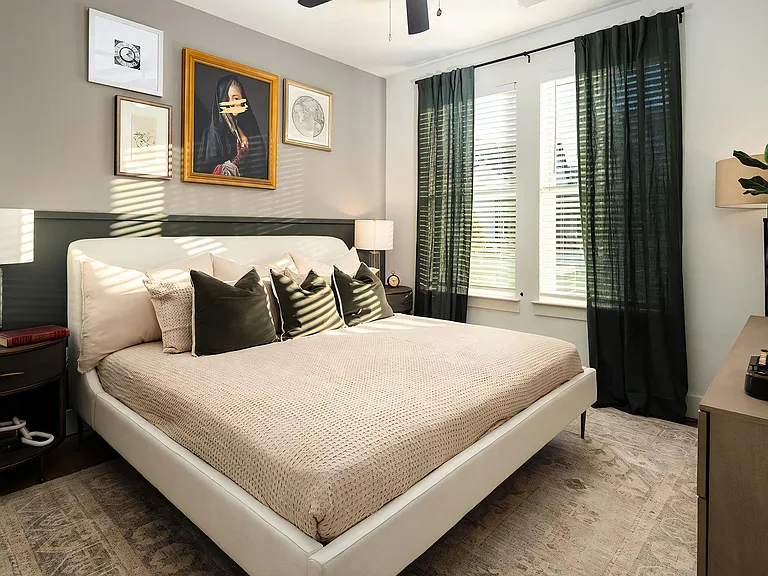 Modern Bedroom with Large Windows and Rich Toned Decor