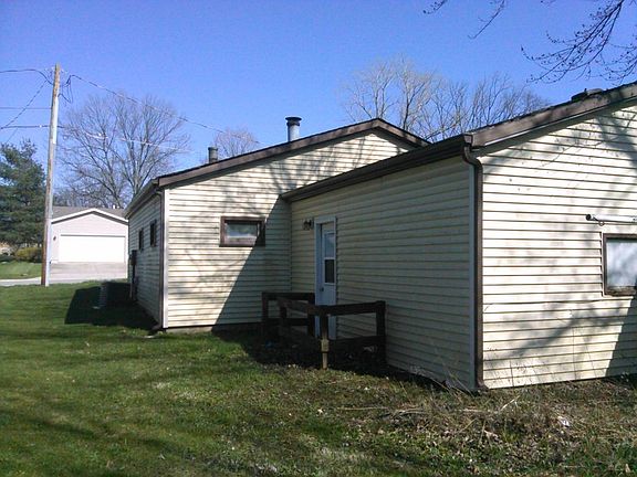 Back Yard
						:
						Access from garage - There's room for a small porch, grill or to store firewood