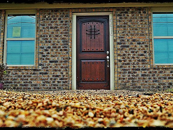  The new Brick siding, Rustic hardwood front door and new energy efficient windows give this home the feel of a new house.