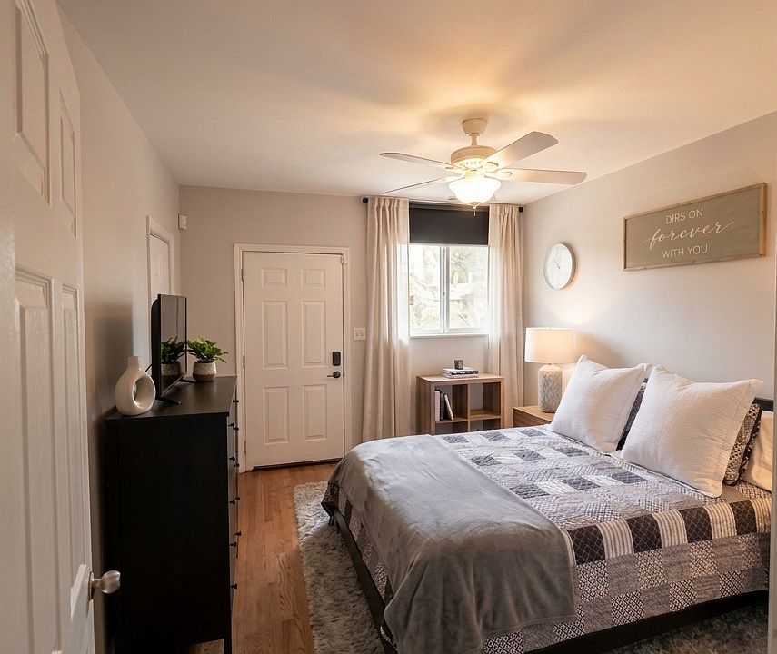 Primary with custom-built walk-in closet and en suite bathroom