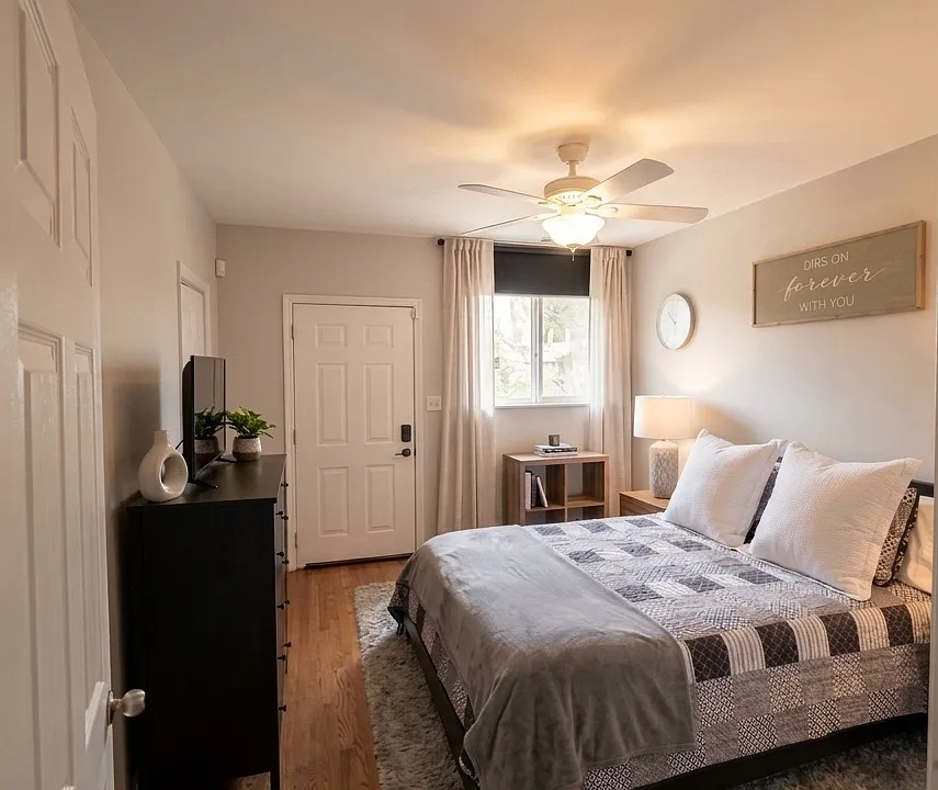 Primary with custom-built walk-in closet and en suite bathroom
