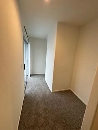 Third floor storage area and washer/dryer area