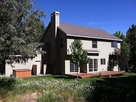 Back of house, yard & hot tub