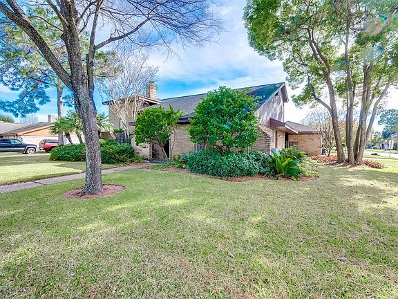 This property sits on a large corner lot in a lovely tree-lined neighborhood.