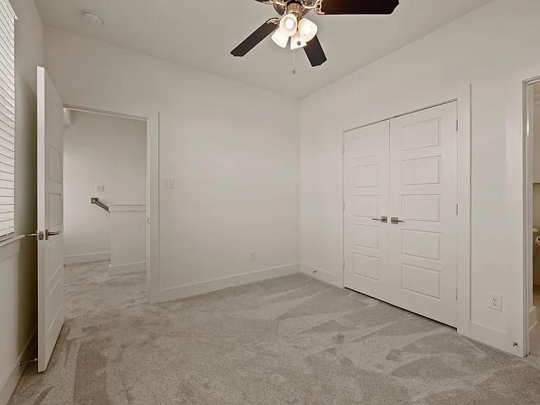 Bedroom #2 with large closet and en suite full bathroom