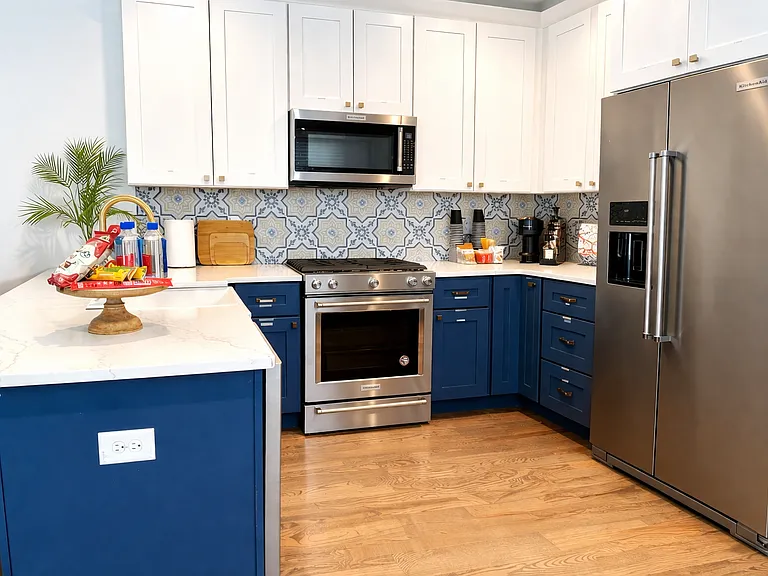 This House of Design curated kitchen is made for gourmet moments. Fully-stocked amenities, fridge, stove, oven, dishwasher, microwave and just about every small appliance possible. The island seats 3 with extra dining space for easy gatherings