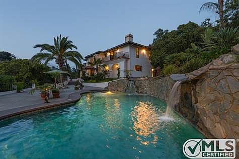 Mediterranean style villa dazzles at night! Taken from the detached Casita/Guest House at dusk.