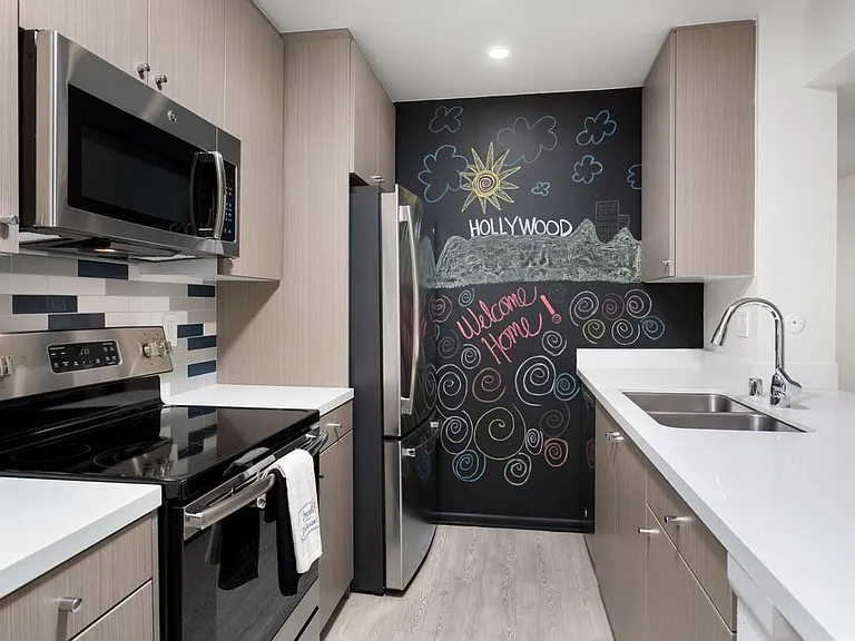 Design Package III Kitchen with hard surface flooring stainless steel appliances