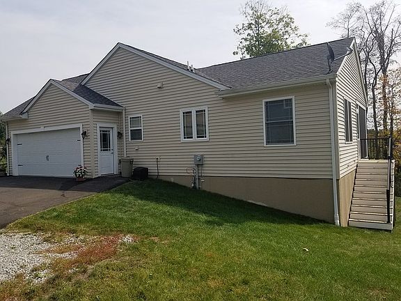 2 car garage, steps to porch