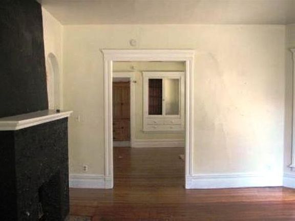 The dining room features elegant Victorian architecture.