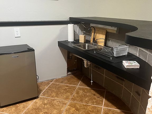 wet bar with mini fridge