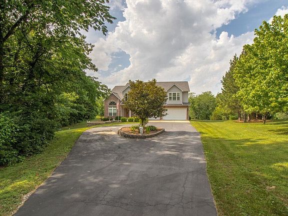 Long tree lined driveway