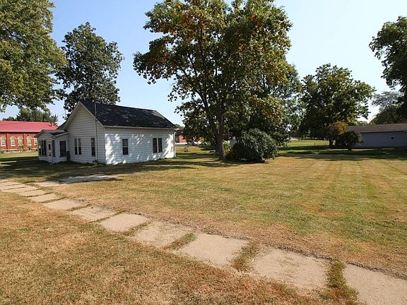 Adjacent vacant lot included with this sale!