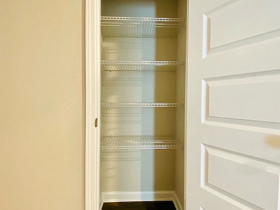Linen closet at entry