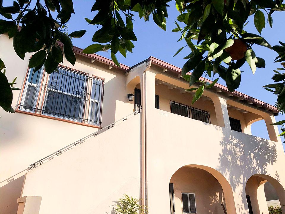 Home sits at the back of property. Large garden, plants, and trees the elderly couple downstairs maintains.