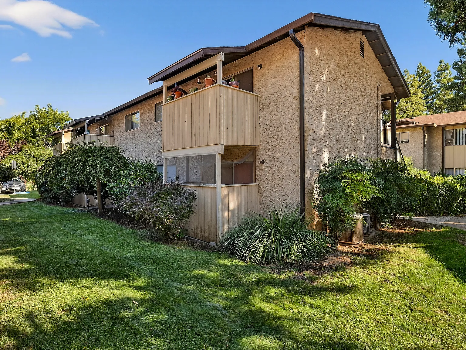 Whispering Trees Apartments — Photo 2