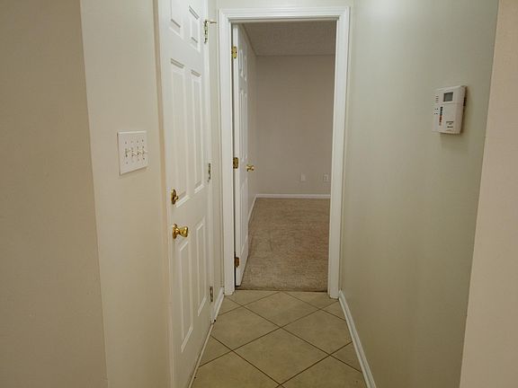 Entry to Garage and Master Bedroom