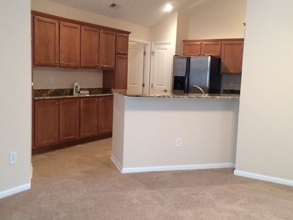 looking into kitchen from living room
