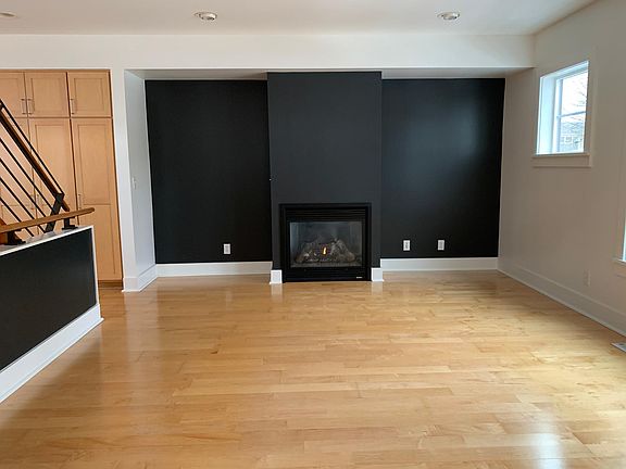 Large living room with gas fireplace.