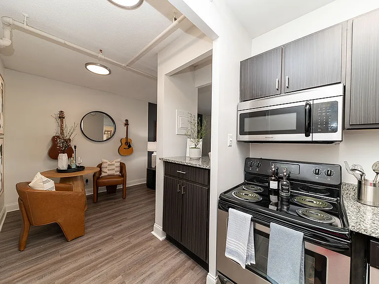 Kitchen with granite counters and stainless appliances